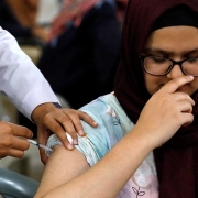 Woman receives COVID vaccine